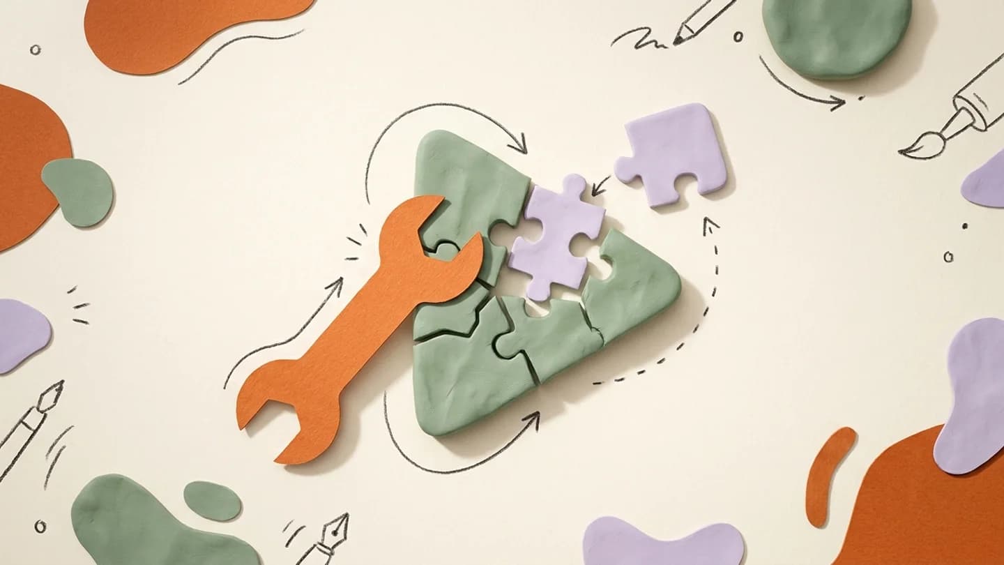 An orange paper wrench gently repairing a sage play-button sculpture, lavender puzzle piece fitting into the gap.